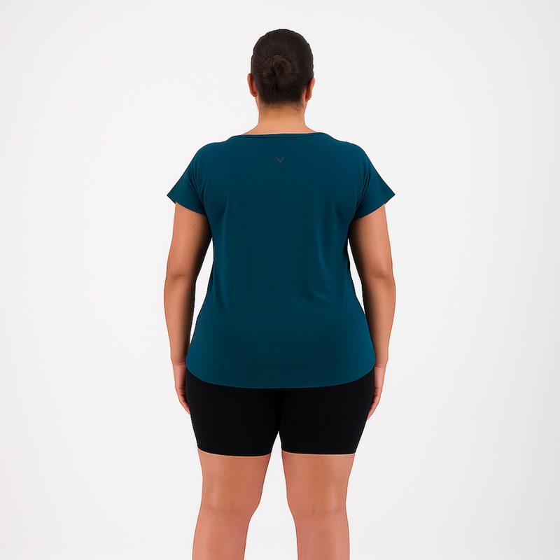 Person wearing a teal t-shirt and black shorts on a white background