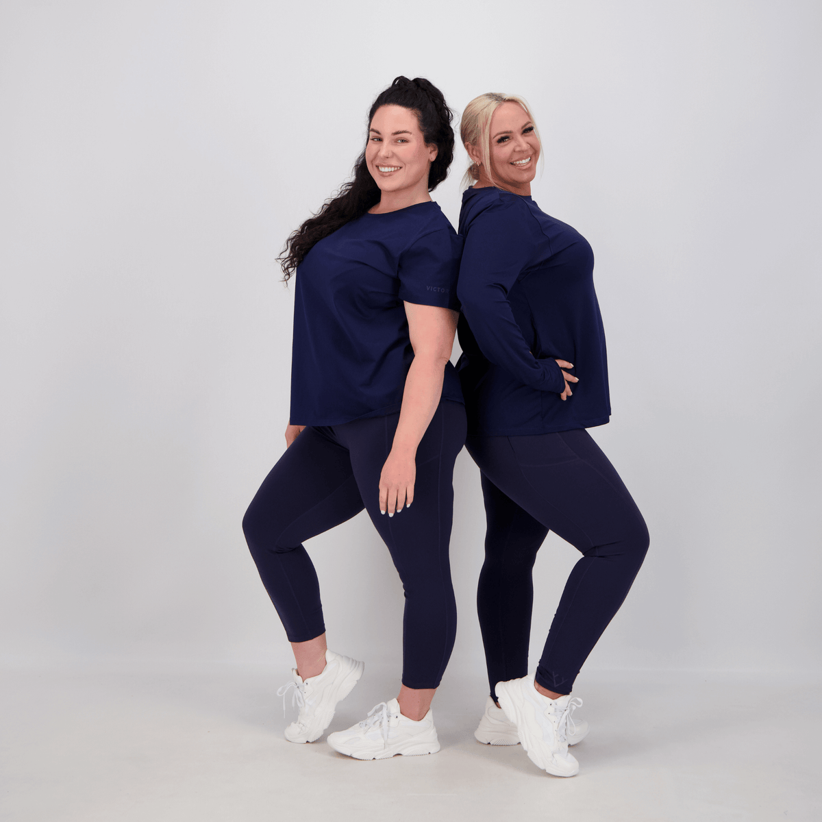two ladies wearing comfortable activewear in navy 