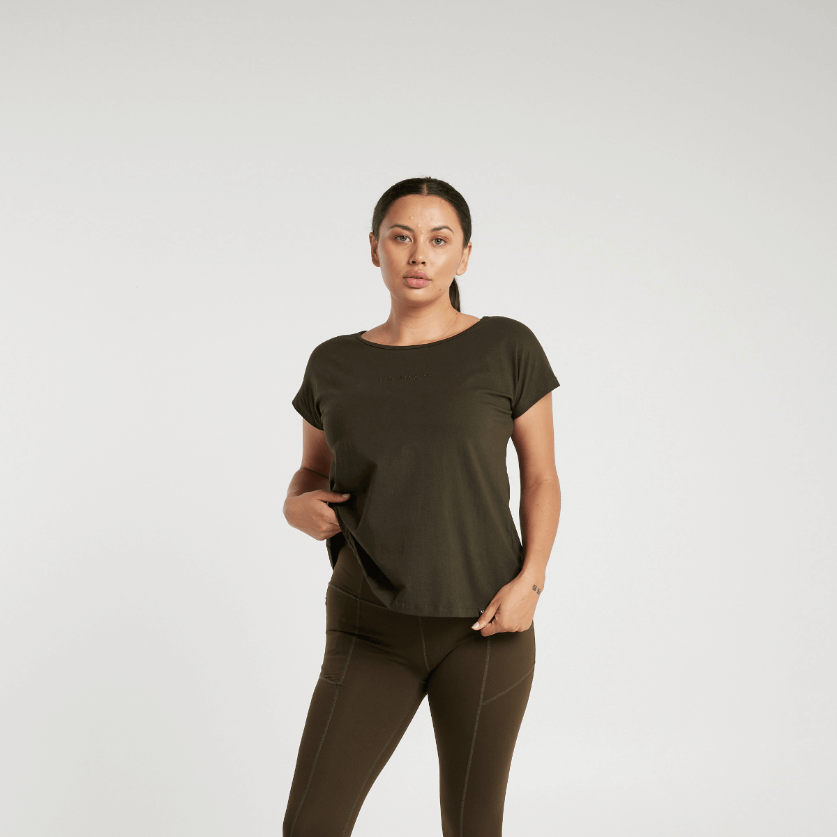Woman wearing Victoria Stag's Core Cap Sleeved Tee in Khaki