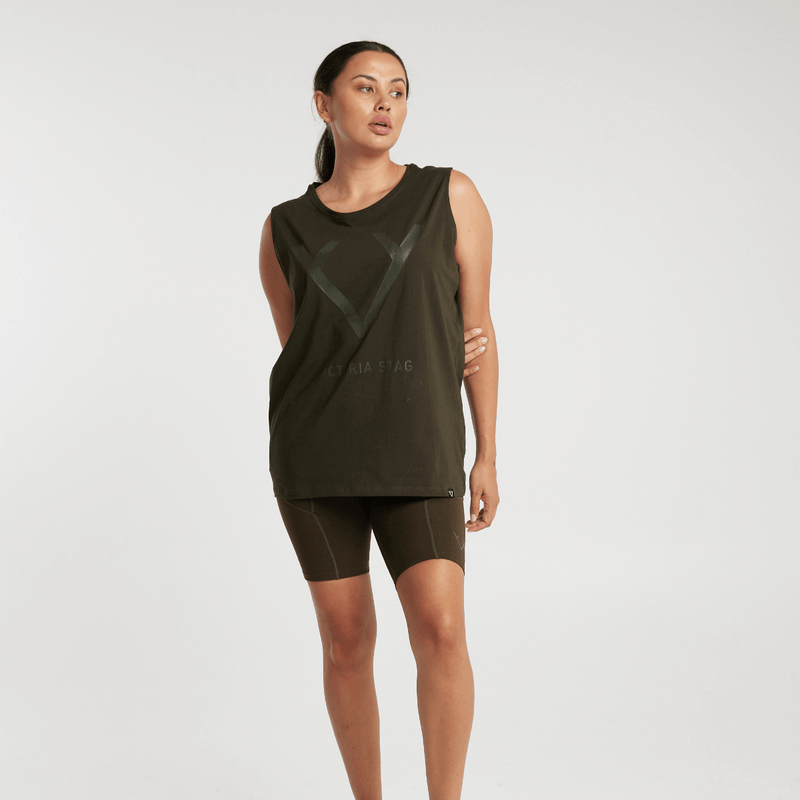 Woman wearing Victoria Stag's Core Muscle Tank in Khaki