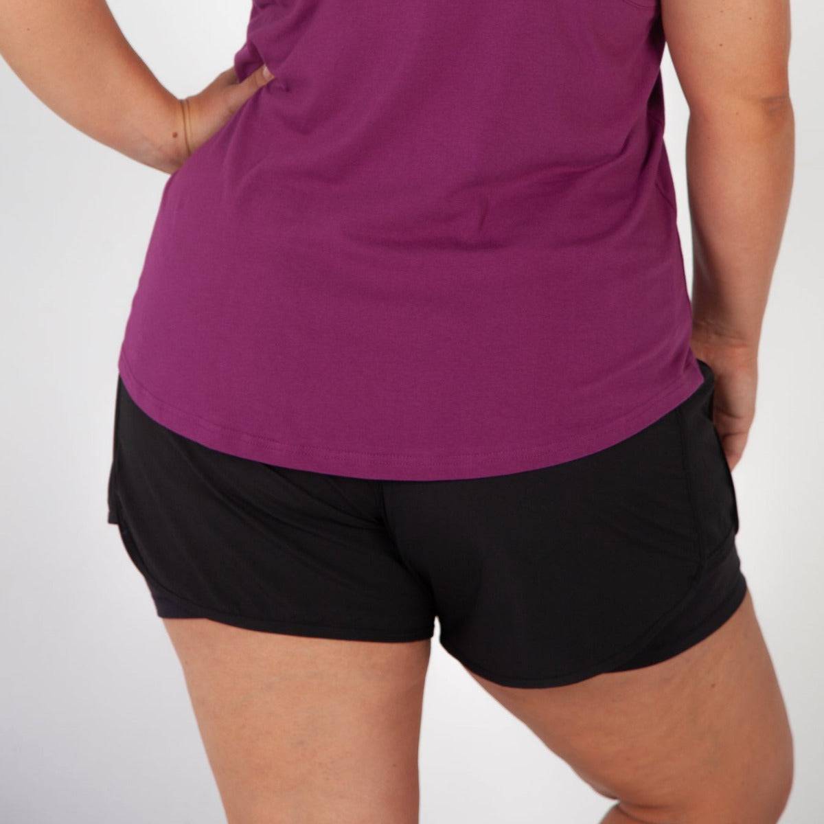 Woman wearing Victoria Stag's Core Running Shorts back