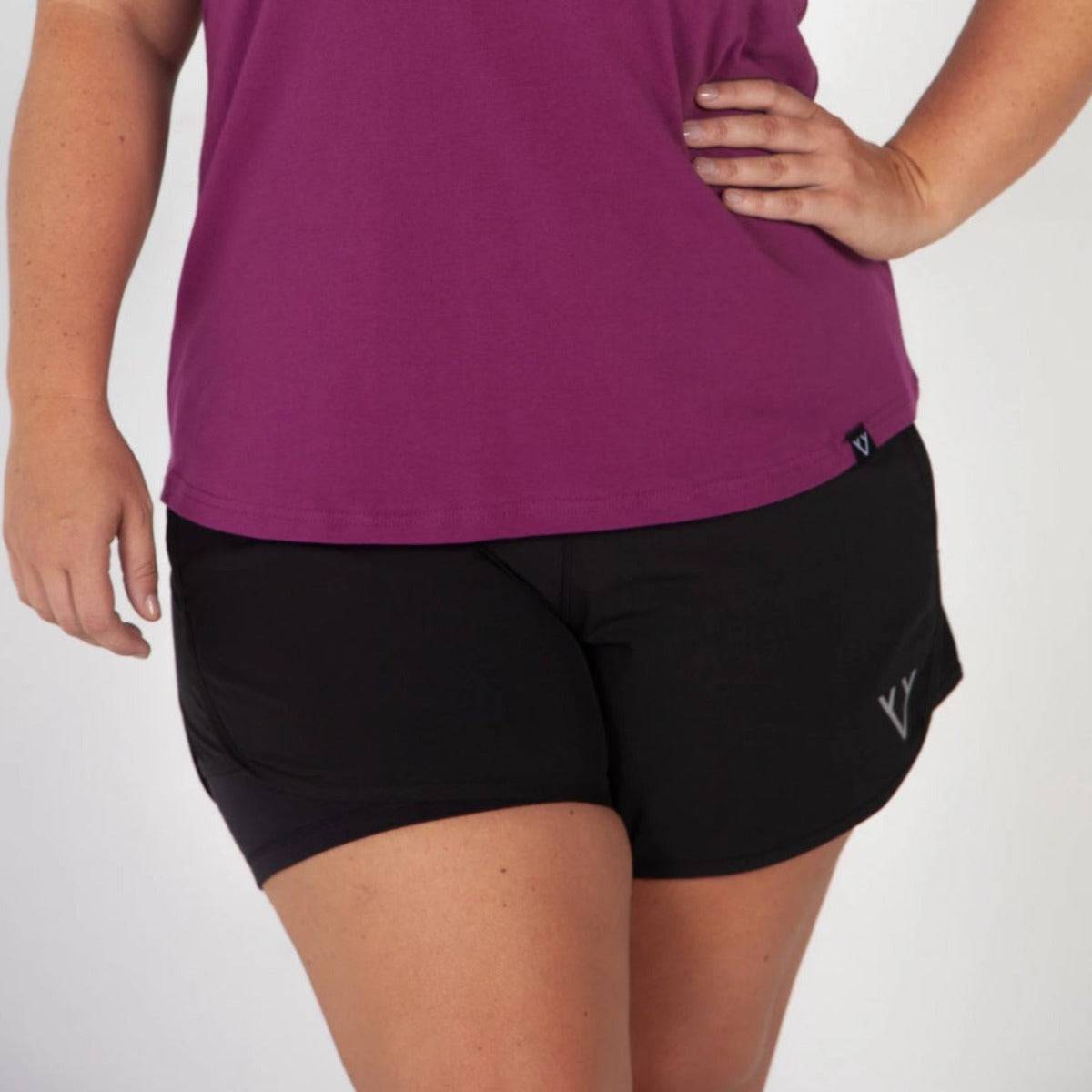 Woman wearing Victoria Stag's Core Running Shorts front