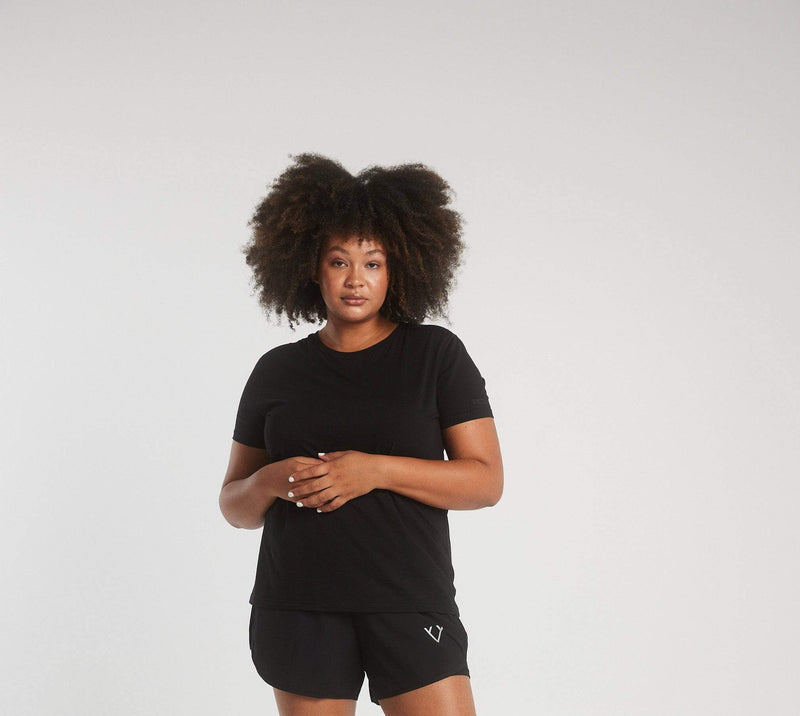 Woman wearing Victoria Stag's Core Trainer Tee in Black