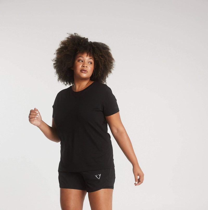 Woman wearing Victoria Stag's Core Trainer Tee in Black