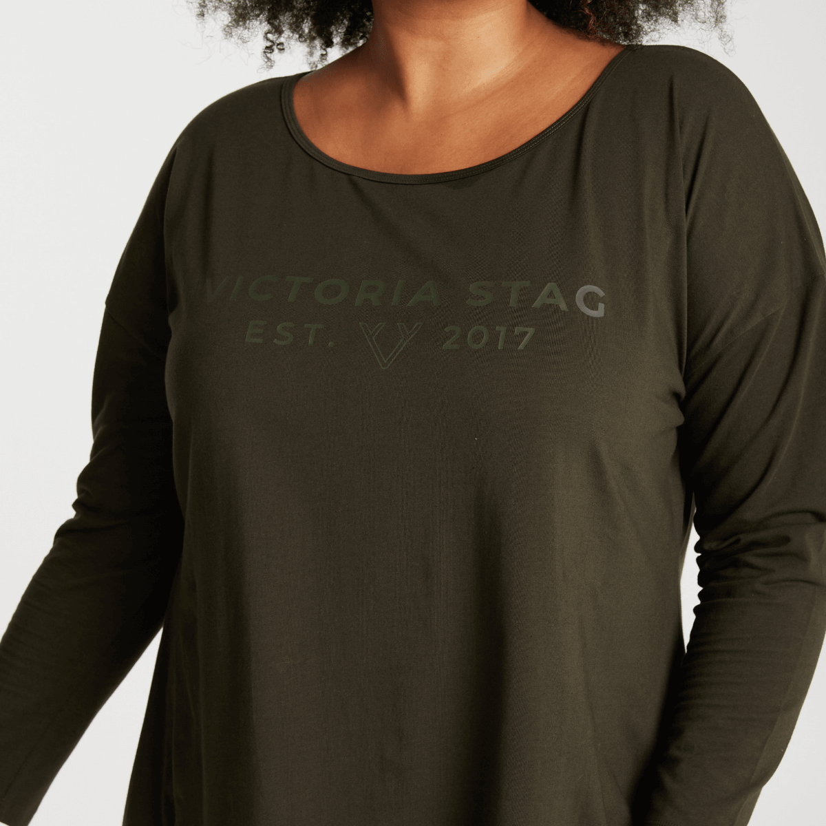 Woman wearing Victoria Stag's Elite Long Sleeve Tee in Khaki front